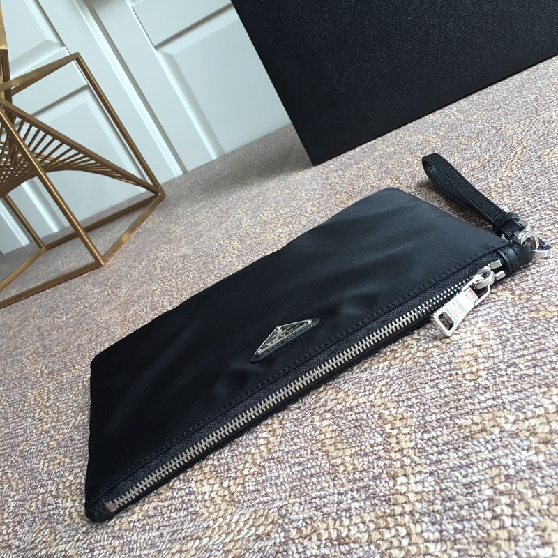 Pra*a clutch bags